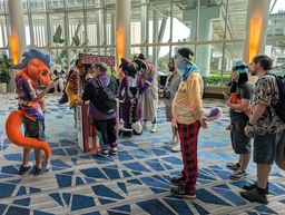 someone at a booth handing out fresh nugs