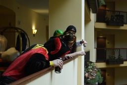 Scrumble, Tra$h, Ada, and Lux taking a pic of Kinger dangling from our floor