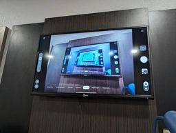 hotel TV successfully hacked, so of course we pull out the camera and do the recursion funny